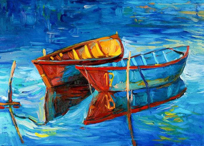 Painting of boats on the water at an art gallery in Maine