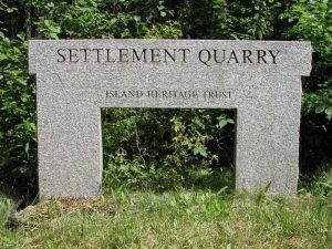 Settlement Quarry stone sign